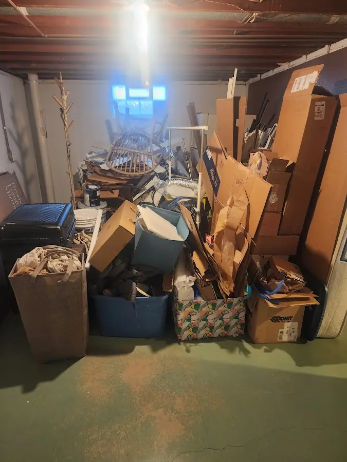 Roll-off dumpster container at job site for 6 Yard Dumpster Rental in Honeygo